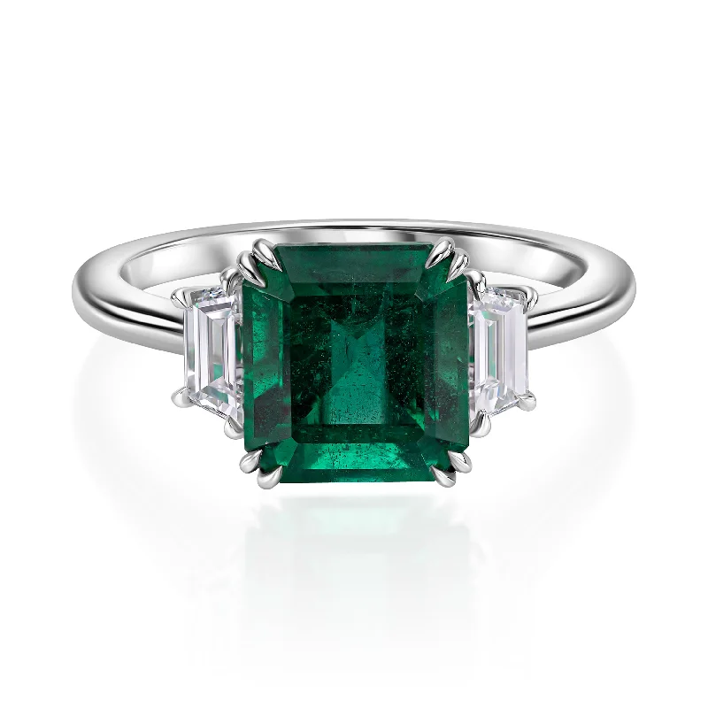 3.20 carat emerald ring with 0.50 carat natural diamonds