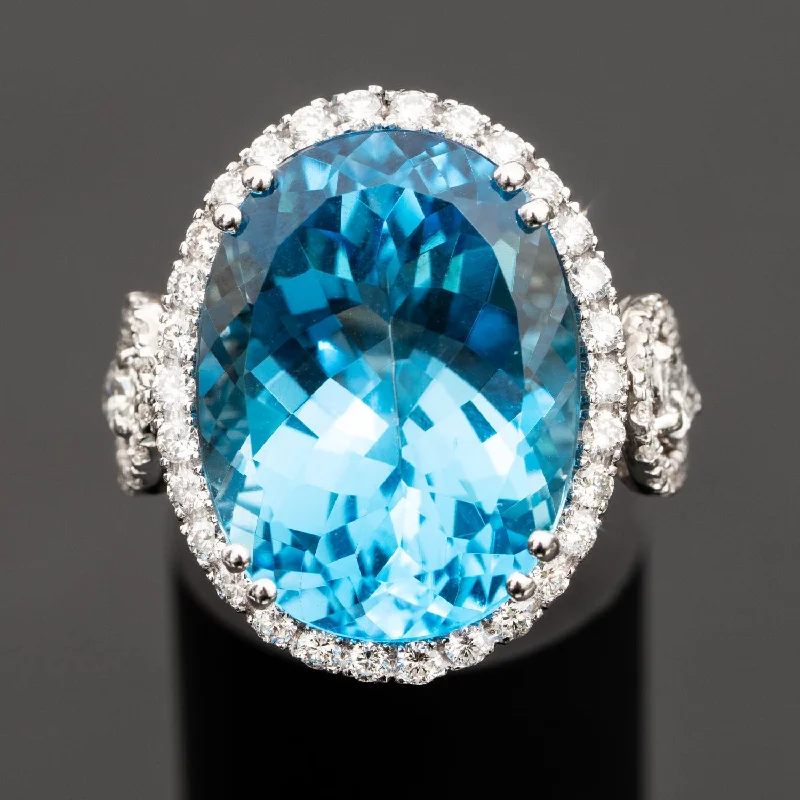 Carly - 22.00 carat natural swiss blue topaz ring with 1.74 carat diamonds