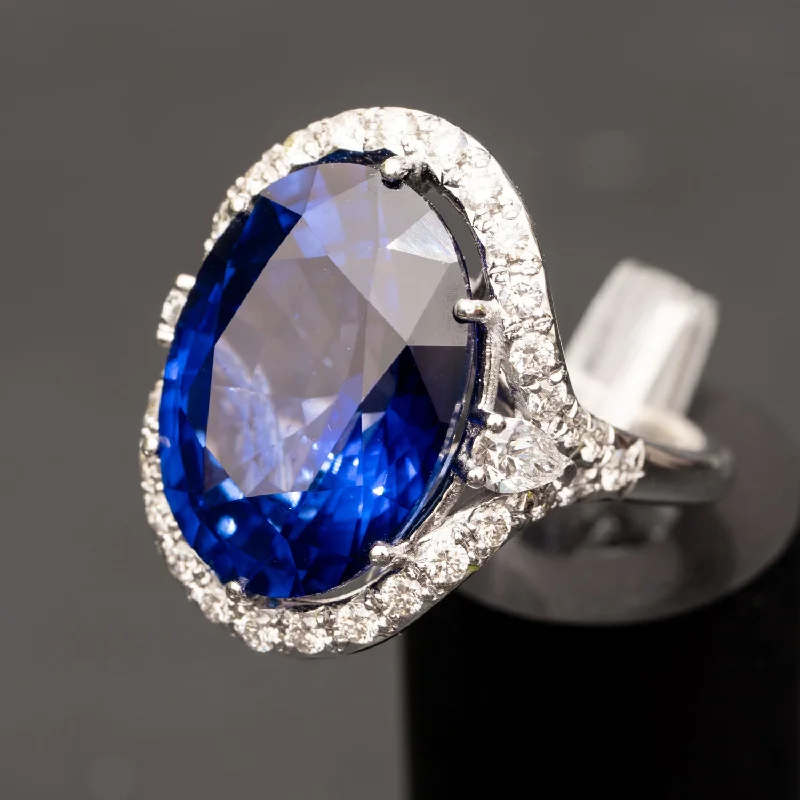 Cora - 25.00 ct oval sapphire ring with 1.46 carat natural diamonds