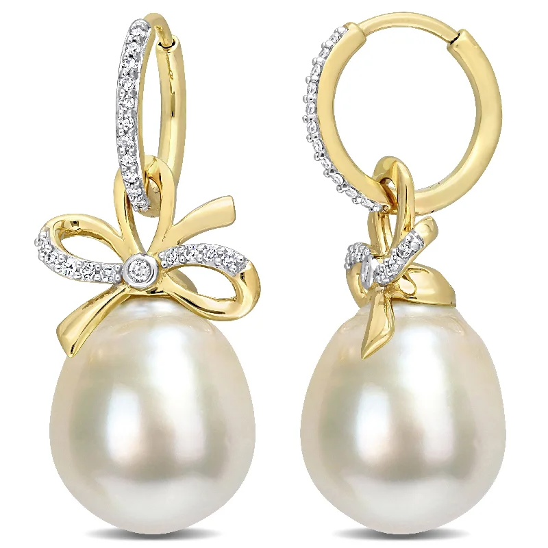 Miadora 12-12.5mm Oval Golden South Sea Cultured Pearl & 1/4 CT TW Diamond Bow Huggie Earrings in 14k Yellow Gold